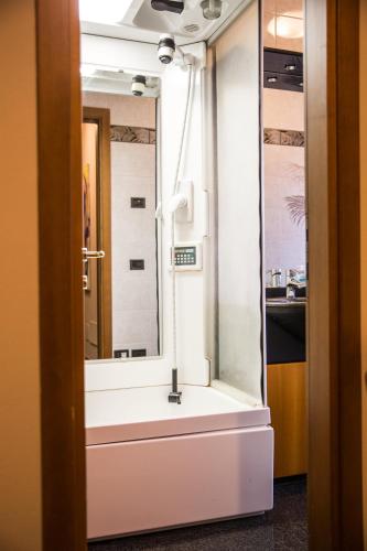 a bathroom with a sink and a mirror at Villa Ivana in Desenzano del Garda