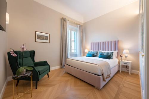 A bed or beds in a room at Apartments Florence- Granduca Penthouse