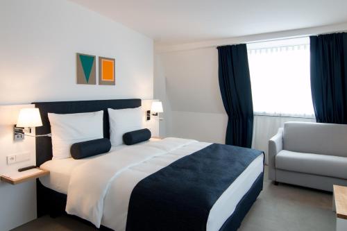 Een bed of bedden in een kamer bij VI VADI HOTEL BAYER 89