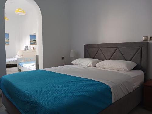 Postel nebo postele na pokoji v ubytování Zenith Luxury Apartments Near Kaiki Beach
