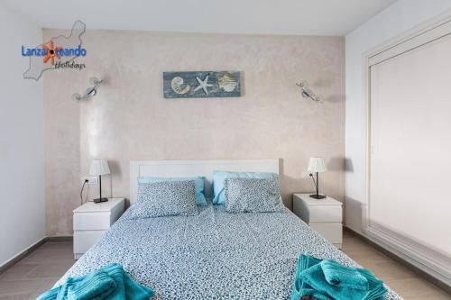 Postel nebo postele na pokoji v ubytování Vivienda Vacacional Papillon