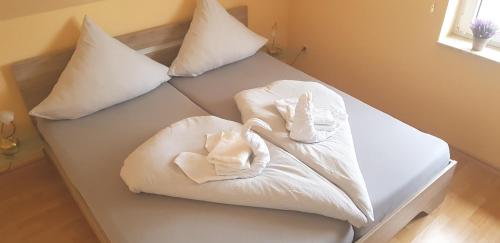 Katil atau katil-katil dalam bilik di Suite Holiday