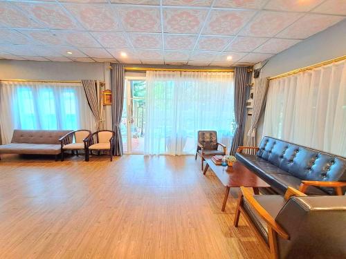 Χώρος καθιστικού στο Amantra homestay & village