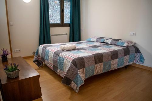 Ένα ή περισσότερα κρεβάτια σε δωμάτιο στο Apartamentos Princesa Park 3000