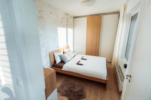 Posteľ alebo postele v izbe v ubytovaní Modern apartment in centre with amazing view