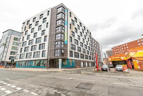 a tall building on the corner of a street at For Students Only Glassworks in Liverpool in Liverpool