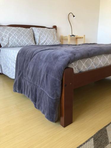 Кровать или кровати в номере excelente apartamento completo