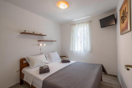 Katil atau katil-katil dalam bilik di Charming House in Stari Grad