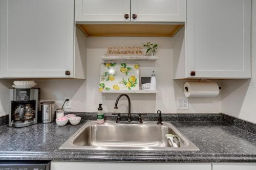 a kitchen counter with a sink in a kitchen at Grand Junction Vacation Rental Indoor Pool Access in Grand Junction