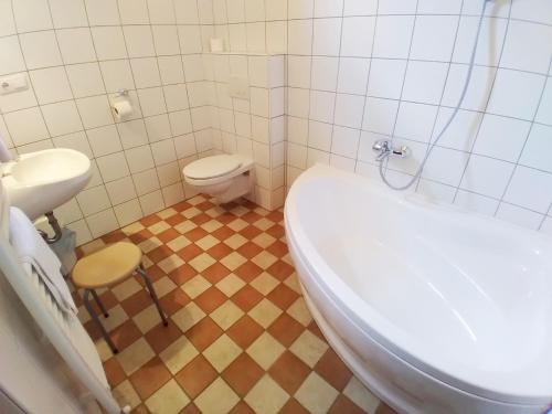 Un baño de Jackfall Apartman és Fogadó