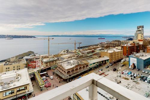 an aerial view of a city with a body of water at Serene in Seattle in Seattle