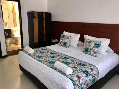 Postel nebo postele na pokoji v ubytování Hotel Casa Lamay