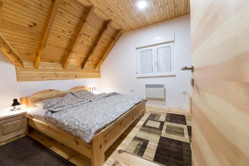 Postel nebo postele na pokoji v ubytování Stojanov Konak