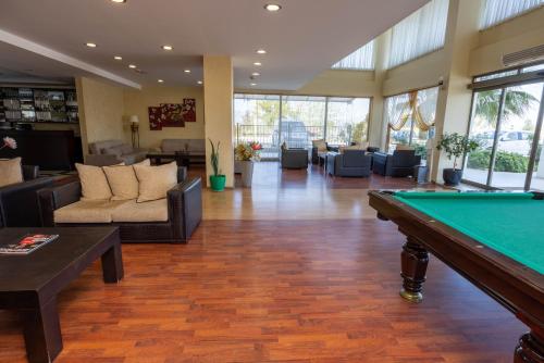 a lobby with a pool table in a room at selin otel spa belek in Belek