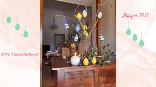 a room with a dresser with a mirror and some fruit at B&B Il Giardino di Paola in Alliste