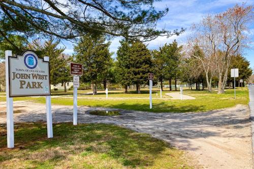 a sign for a park with several signs in the grass at Sea Oaks --- 4 Osprey Ln in Ocean View