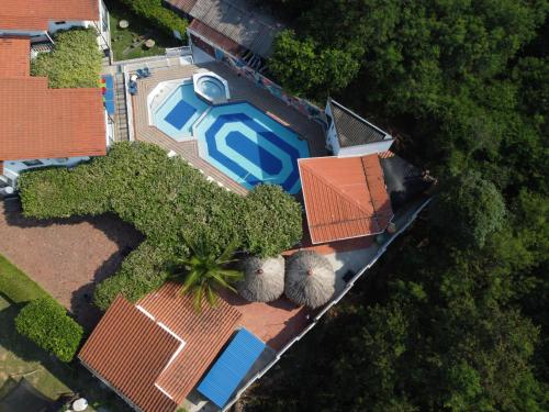 an overhead view of a house and a swimming pool at Villa Alejandra in Girardot