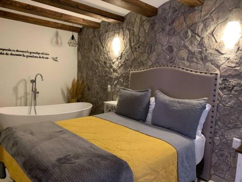 Katil atau katil-katil dalam bilik di Hermoso departamento en Val’Quirico Loft Frontana