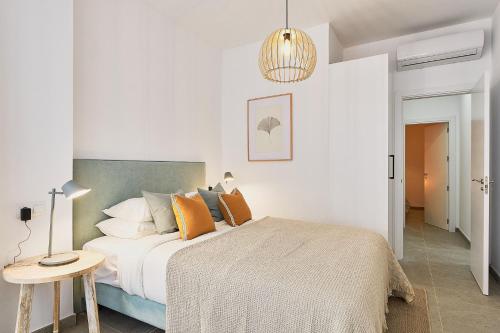 Postel nebo postele na pokoji v ubytování Soho Apartments in Malaga by Solaga Holiday Homes