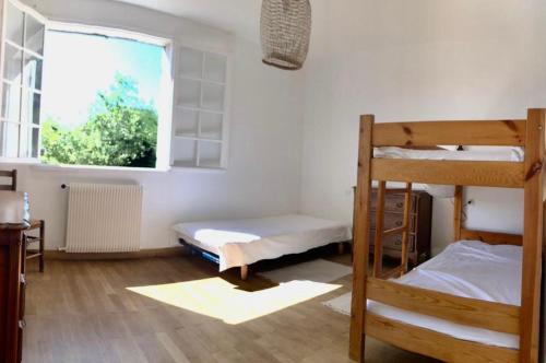 Ένα ή περισσότερα κρεβάτια σε δωμάτιο στο Angels' Home