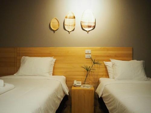 Cama o camas de una habitación en Kinnotel