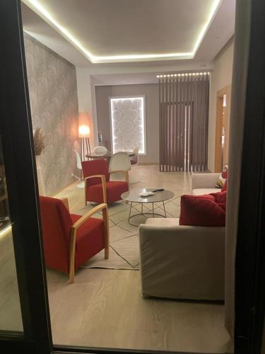 a living room with couches and a table at Anfa Place, Luxury Apartment just renovated, Ocean View in Casablanca