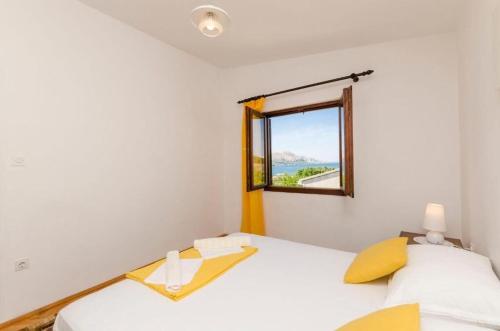 Posteľ alebo postele v izbe v ubytovaní Apartments Spavalo