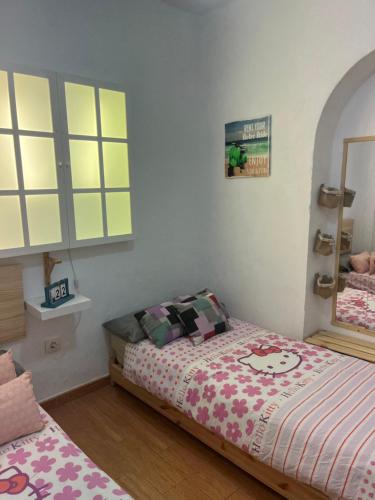 Posteľ alebo postele v izbe v ubytovaní Apartamento Veracruz