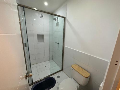 a bathroom with a shower and a toilet at CASA CRISTOBAL Siete Cuartones in Cusco