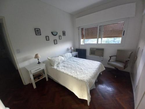 Ένα ή περισσότερα κρεβάτια σε δωμάτιο στο Departamento Sarmiento