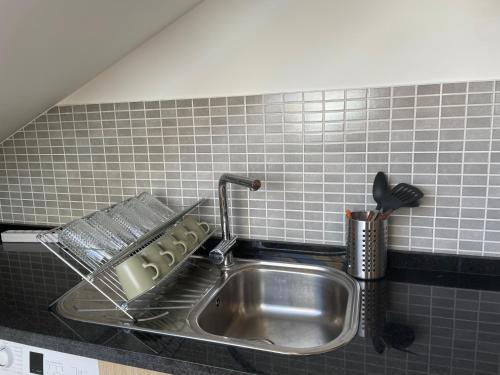 Dapur atau dapur kecil di Ático Rúa Laxiela