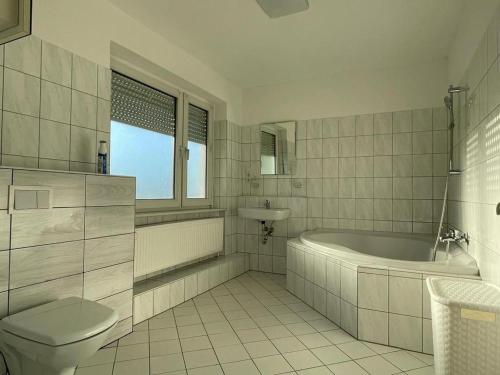 Kúpeľňa v ubytovaní Gemütliche 3Zi Ferienwohnung