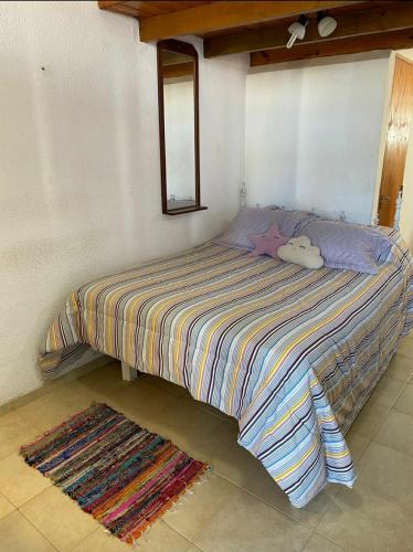 A bed or beds in a room at Alquiler Santa Clara Del Mar