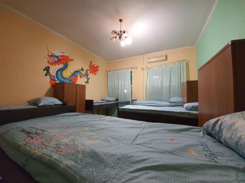 Postel nebo postele na pokoji v ubytování Likehostel