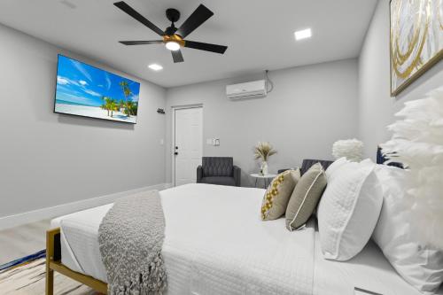 Ein Bett oder Betten in einem Zimmer der Unterkunft Tropical Paradise