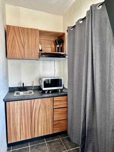 Kuchyň nebo kuchyňský kout v ubytování Departamentos Mayai & Yahelik