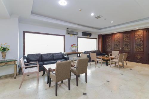 Zona de estar de Urbanview Hotel Taman Suci Denpasar Bali