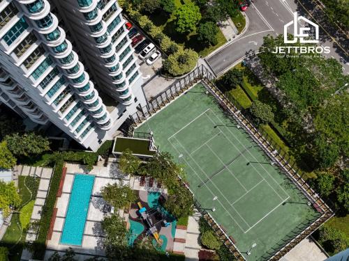 an overhead view of a tennis court in a city at Teega Suites By JettBros Johor Bahru in Nusajaya