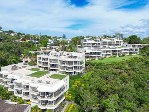 an aerial view of a large apartment building at Noosa Crest Penthouse 40 - Private Rooftop Pool in Noosa Heads