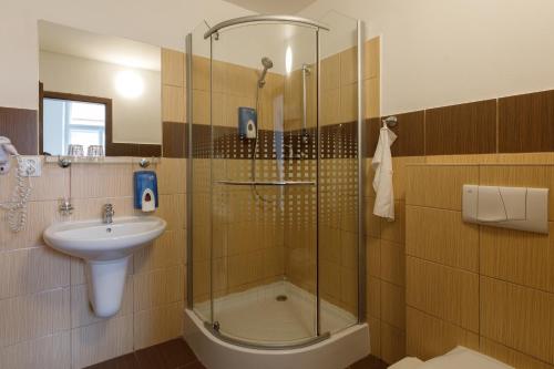 Kylpyhuone majoituspaikassa Litvan SUNSET Apartments