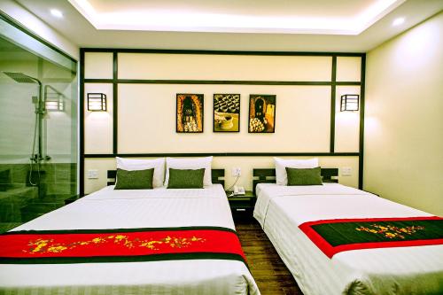 Postel nebo postele na pokoji v ubytování Hoi An Riverland Villa - Hoi An Center