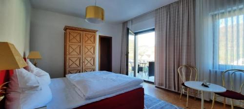 Postel nebo postele na pokoji v ubytování Gästehaus Föhr