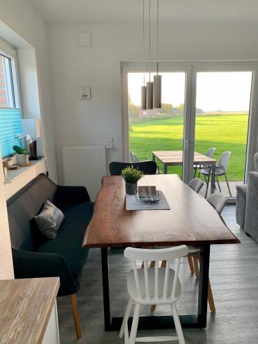 Ruang duduk di Ferienhaus - Heimathafen Tossens