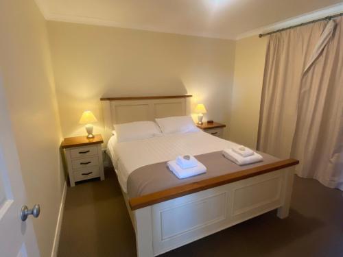 Ένα ή περισσότερα κρεβάτια σε δωμάτιο στο Manyat Peak cottages