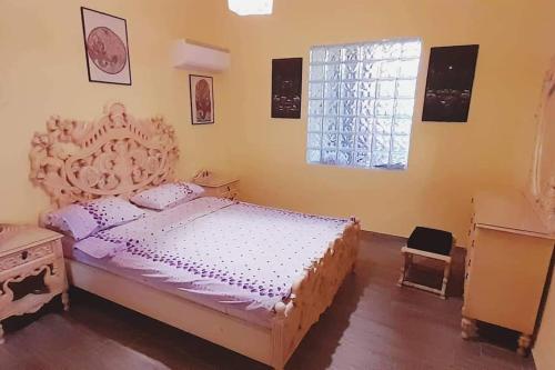 A bed or beds in a room at Amethyst