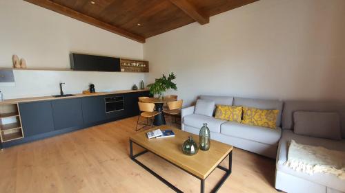 a living room with a couch and a table at Finca La Suerte Grande in Telde