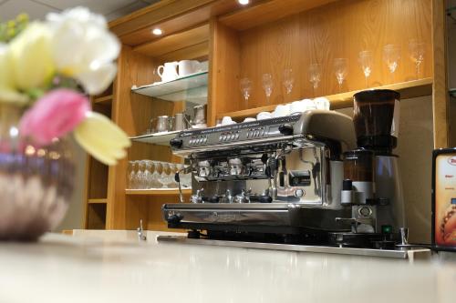 a coffee maker sitting on a counter in a kitchen at Country House Elite in Cascia