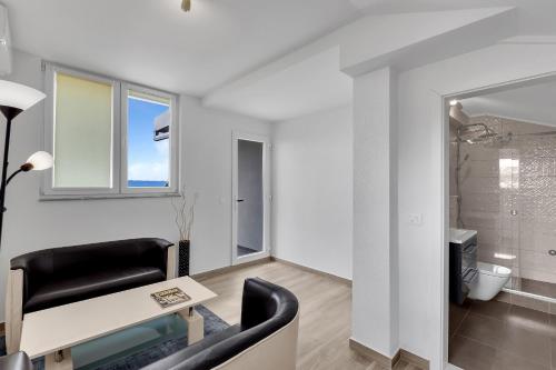 Ванная комната в Apartments Lujnovic