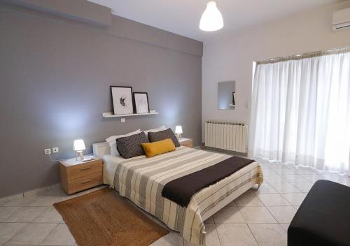Katil atau katil-katil dalam bilik di Sunset Apartment