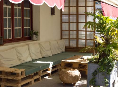 Posezení v ubytování L'escale Surf Hostel - Auberge de jeunesse